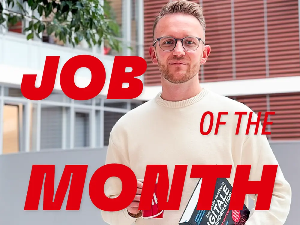 Social Media image featuring a Job of the Month and highlighting the role of Digital Transformation Manager at Henkel, with a modern office background.